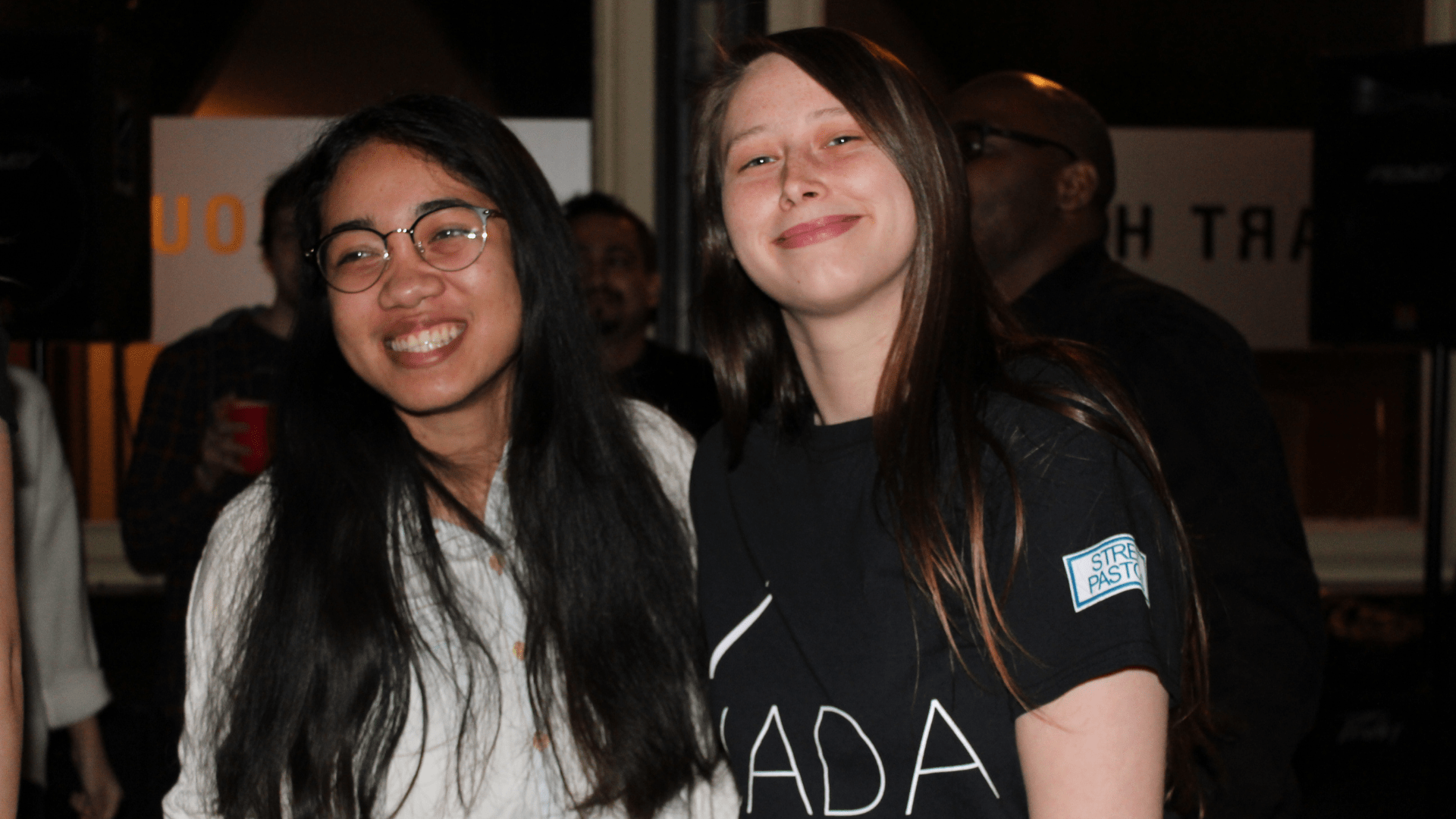 2 participants at YADA's sober party-style events, smiling at the camera